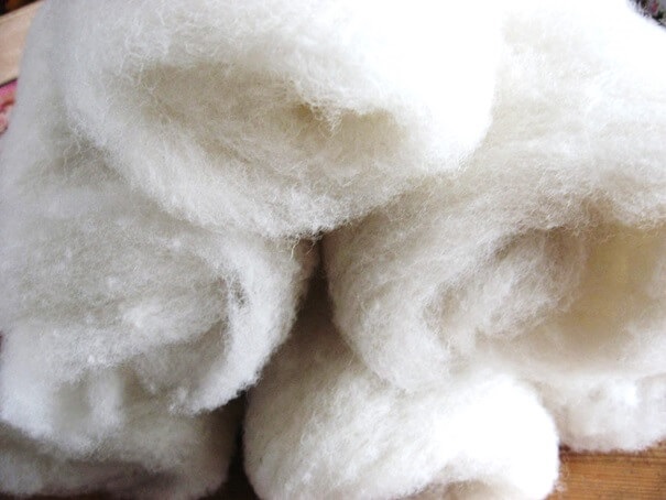 Welke materialen heb je nodig voor het maken van een tricot poppenhoofdje 